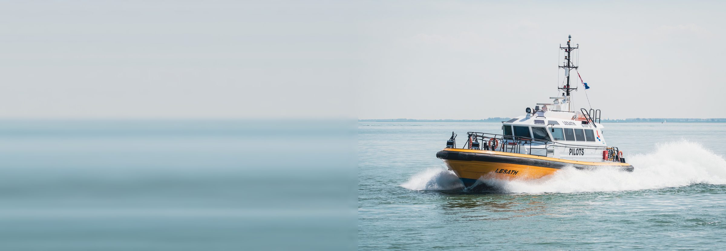 Marine brands for UK trade: pilot boat at speed with a bow wave